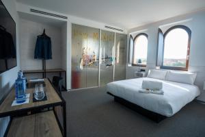 Postel nebo postele na pokoji v ubytování Hotel Melibea by gaiarooms