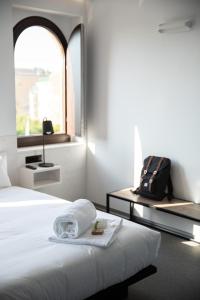 Postel nebo postele na pokoji v ubytování Hotel Melibea by gaiarooms