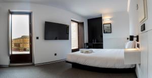 Postel nebo postele na pokoji v ubytování Hotel Melibea by gaiarooms