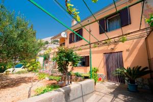 Zahrada ubytování STUDIO APARTMAN STARA BAŠKA