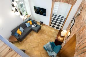 an overhead view of a living room with a couch at Cracowapart Loft Gertruda in Krakow