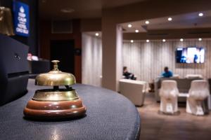 TV a/nebo společenská místnost v ubytování Hotel Oro Blu