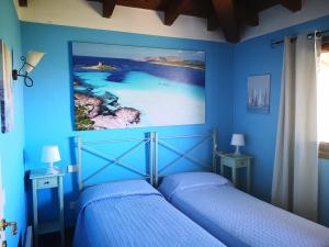 Кровать или кровати в номере Villa Angeli Luxury Piscina Esclusiva