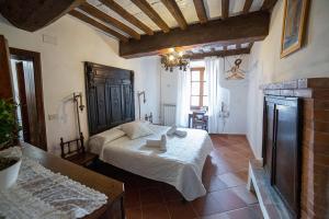 Voodi või voodid majutusasutuse Dulcis in Borgo toas