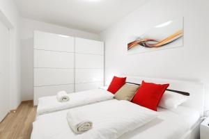 En eller flere senge i et værelse på Bellevue apartment