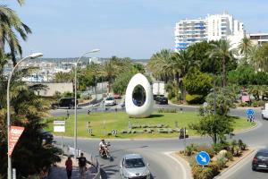 a view of a street with a large white sculpture at Sunside Ibiza Studios - Only Adults- Formerly known as Central Park in San Antonio