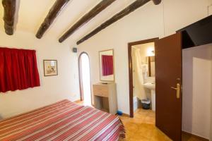 Postel nebo postele na pokoji v ubytování Hotel - Bungalows Don Juan Tossa