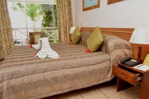 Postel nebo postele na pokoji v ubytování Coco D'or Hotel Seychelles + 24 fotografií