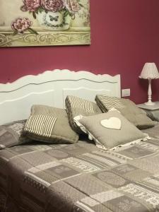 Posteľ alebo postele v izbe v ubytovaní B&B Sul Garda