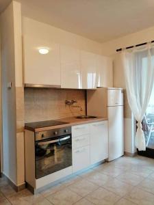 Kuchyň nebo kuchyňský kout v ubytování Apartment Gajac Zrće Novalja