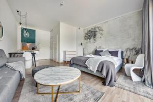 Posteľ alebo postele v izbe v ubytovaní Apartamenty Sun & Snow Seaside Grzybowo
