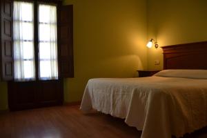 Cama o camas de una habitación en Casas Rurales Las Corradas