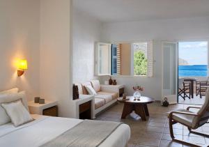 Posteľ alebo postele v izbe v ubytovaní Plaka Sea Front Residence