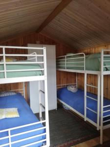 Postel nebo postele na pokoji v ubytování Insel Korsnäsudden