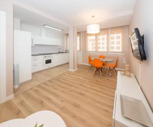 Kuchyňa alebo kuchynka v ubytovaní Gestión de Alojamientos Apartments
