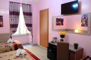 TV a/nebo společenská místnost v ubytování B&B Roma Castle Termini