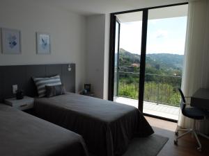 Postel nebo postele na pokoji v ubytování Casa de S. Brás + 45 fotografií