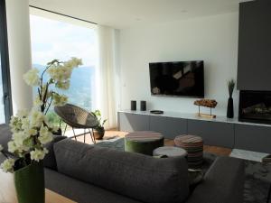 TV a/nebo společenská místnost v ubytování Casa de S. Brás