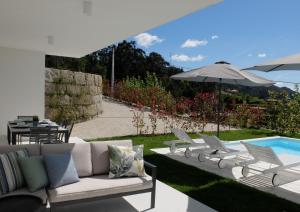 Bazén v ubytování Casa de S. Brás nebo v jeho okolí