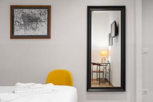 Postel nebo postele na pokoji v ubytování ParcoSantaTeresa Suites LOC-02279