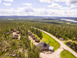 an aerial view of a resort in a forest at Aava Sky Village Aurinkomaja in Aavasaksa