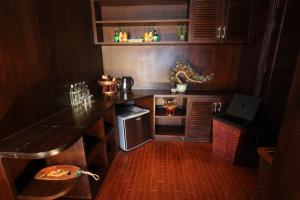 A kitchen or kitchenette at Singha Montra Lanna Boutique Style Hotel