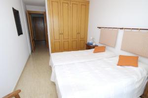 Postel nebo postele na pokoji v ubytování MB, Mareta Blava, piscina y vistas + 9 fotografií