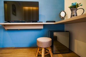 TV a/nebo společenská místnost v ubytování New Live B&B