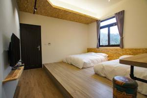 TV a/nebo společenská místnost v ubytování New Live B&B + 22 fotografií
