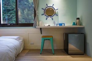 Postel nebo postele na pokoji v ubytování New Live B&B