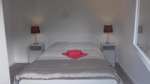 Postel nebo postele na pokoji v ubytování Casa do Chico