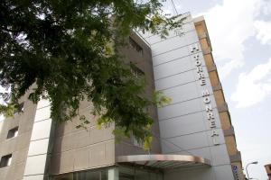 un montage de l'avant d'un bâtiment dans l'établissement Hotel Torre Monreal, à Tudela