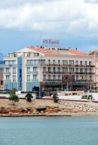 
a large body of water with a large building at Hotel Flamingo in L'Ampolla

