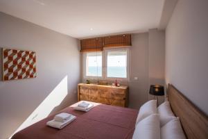 Giường trong phòng chung tại ALTAMAR Sunny Home by Cadiz4Rentals