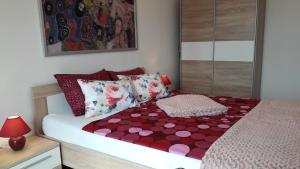Postel nebo postele na pokoji v ubytování Apartments Nina, Pinta & Santa Maria