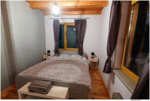 Postel nebo postele na pokoji v ubytování Holiday home Slokas