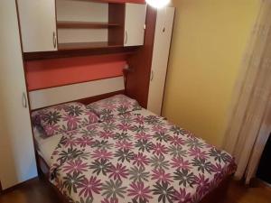 Postel nebo postele na pokoji v ubytování Apartmani Katica