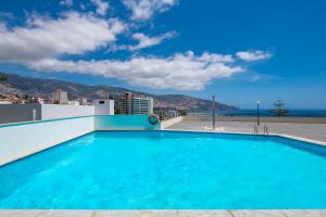 Imagem da galeria de Miramar Apartment with pool by HR Madeira no Funchal