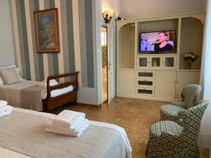 Ліжко або ліжка в номері Hotel David