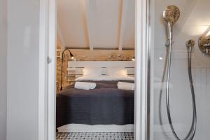 Posteľ alebo postele v izbe v ubytovaní No.5 Luxury Studio