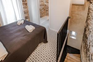 Posteľ alebo postele v izbe v ubytovaní No.5 Luxury Studio