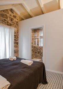 Posteľ alebo postele v izbe v ubytovaní No.5 Luxury Studio