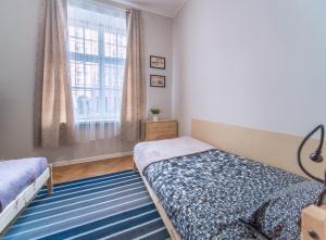 Postel nebo postele na pokoji v ubytování Apartament Staroofka