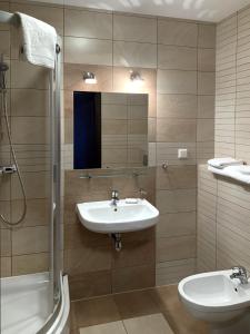 Łazienka w obiekcie Apartament Tit Aquarius Spa