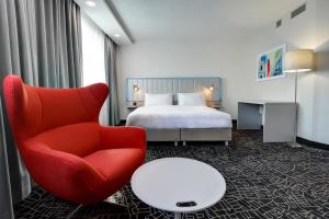 Postel nebo postele na pokoji v ubytování Park Inn by Radisson Danube Bratislava