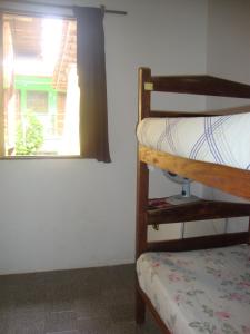 Postel nebo postele na pokoji v ubytování Pousada Caravelas