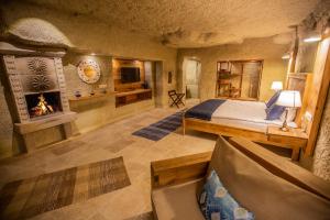 Postel nebo postele na pokoji v ubytování Azure Cave Suites - Cappadocia