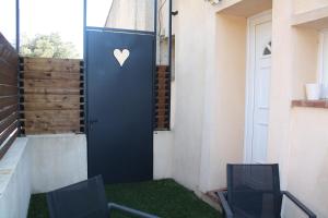 Balkón nebo terasa v ubytování LA PARENTHESE AMOUREUSE