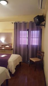 Letto o letti in una camera di Aparthotel Avenida