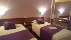 Letto o letti in una camera di Aparthotel Avenida